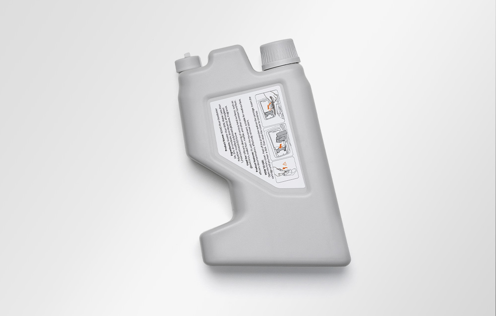 Agent désodorisant dans un conteneur gris marqué d'une étiquette blanche