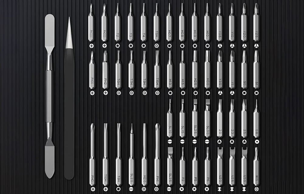 Un ensemble d'embouts, de pinces et d'un outil de levage sur un fond noir.