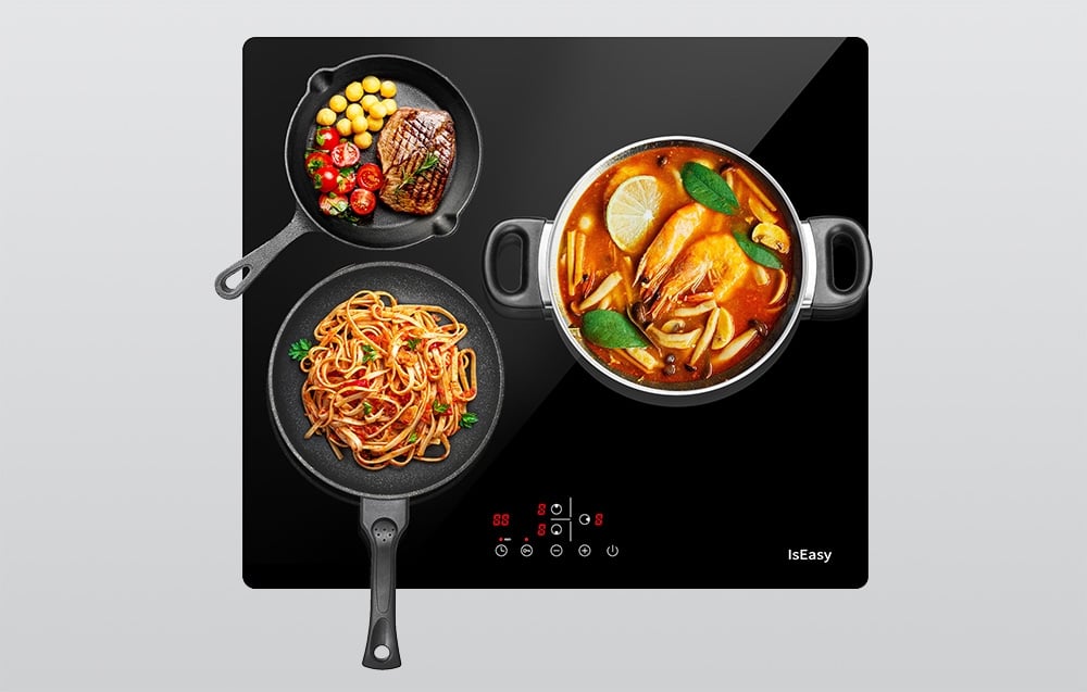 Plaque à induction IsEasy avec trois casseroles : poêle à viande, poêle à pâtes et casserole à soupe