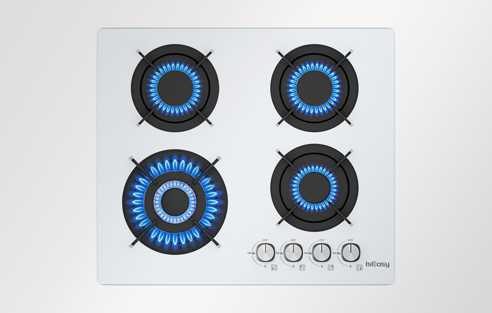 Vue de dessus de quatre brûleurs de cuisinière à gaz allumés avec flamme bleue