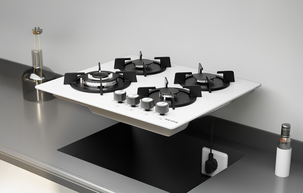 Une cuisinière à gaz avec quatre brûleurs surélevés au-dessus d'une ouverture découpée d'un plan de travail de cuisine